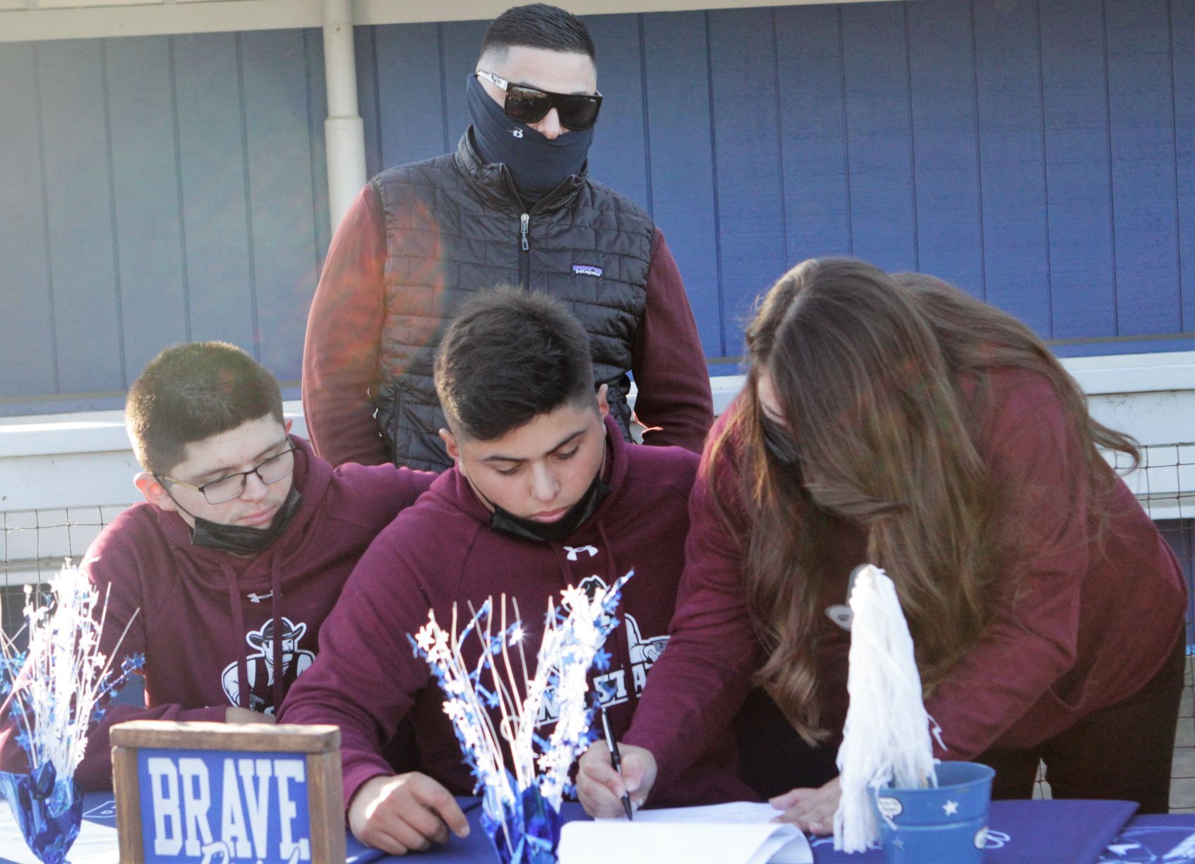 111220 Espinoza signs 13.JPG